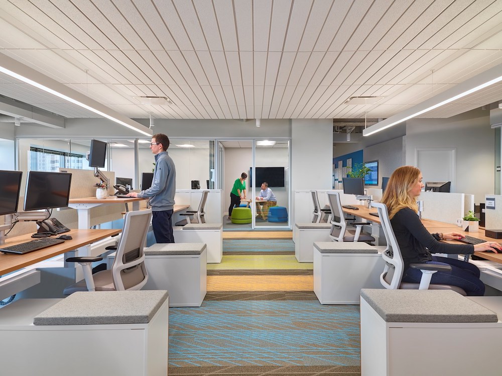 The Institute for Improved Health features biophilic elements – natural materials, fractal patterns, and colours – to enliven the space, along with sit-to-stand desking to encourage regular movement to break up prolonged intervals of sedentary inactivity. - 